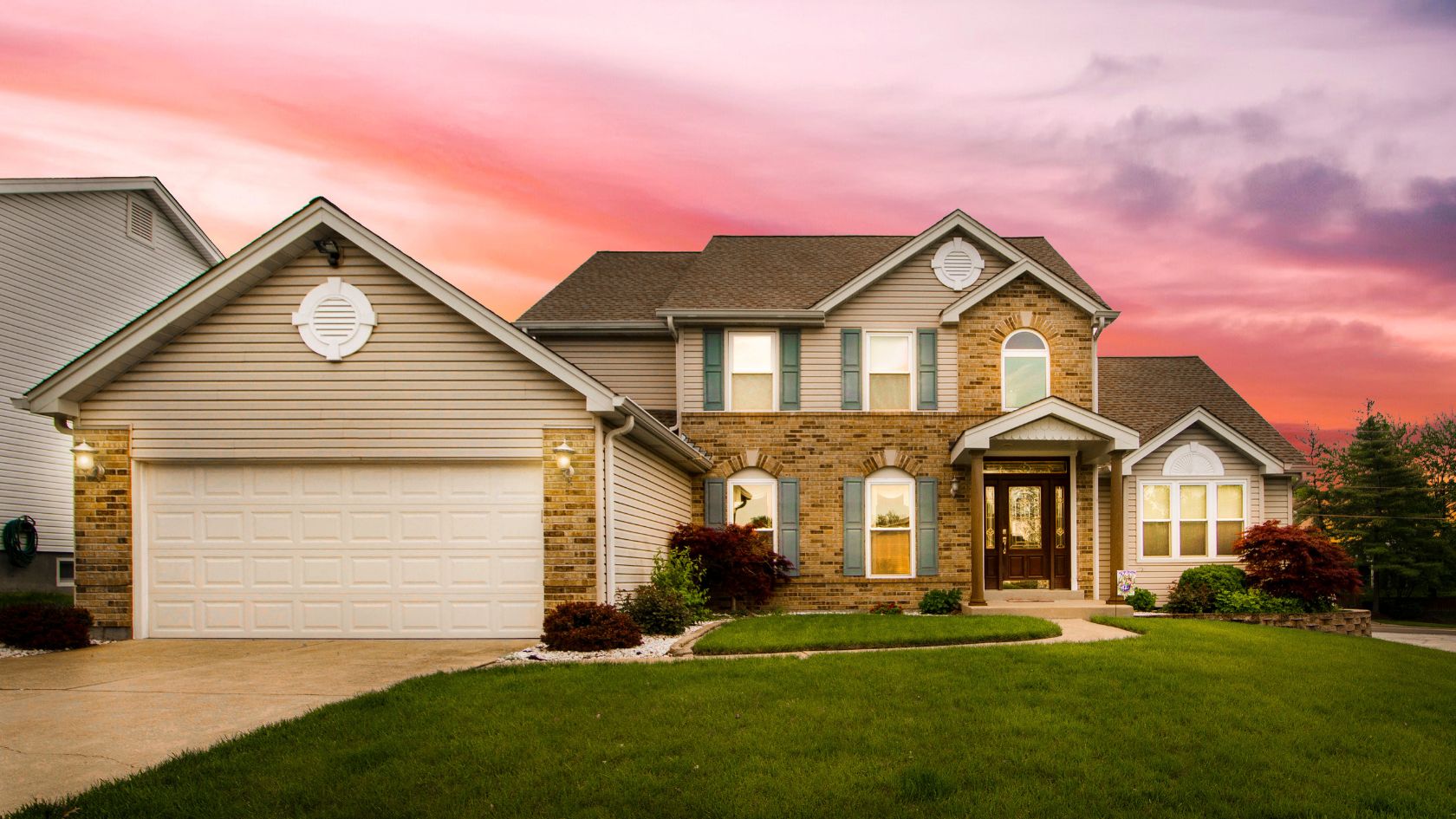 A home with a beautiful sunset in the background